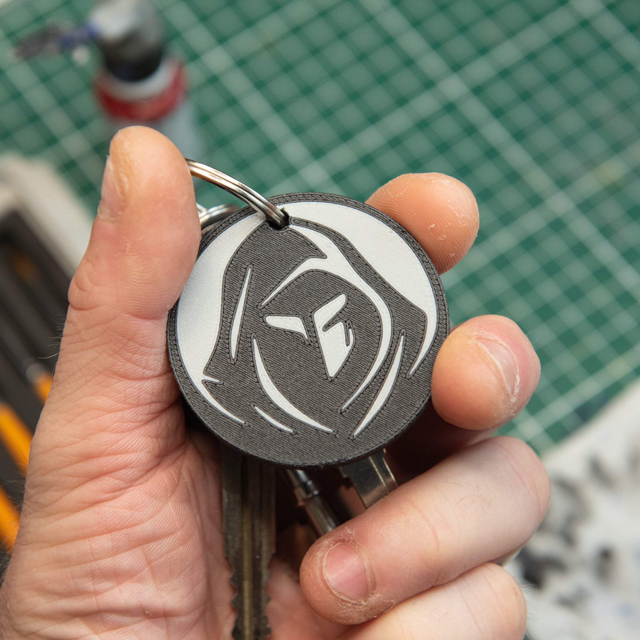 Black Mantle Keyring - The Veil