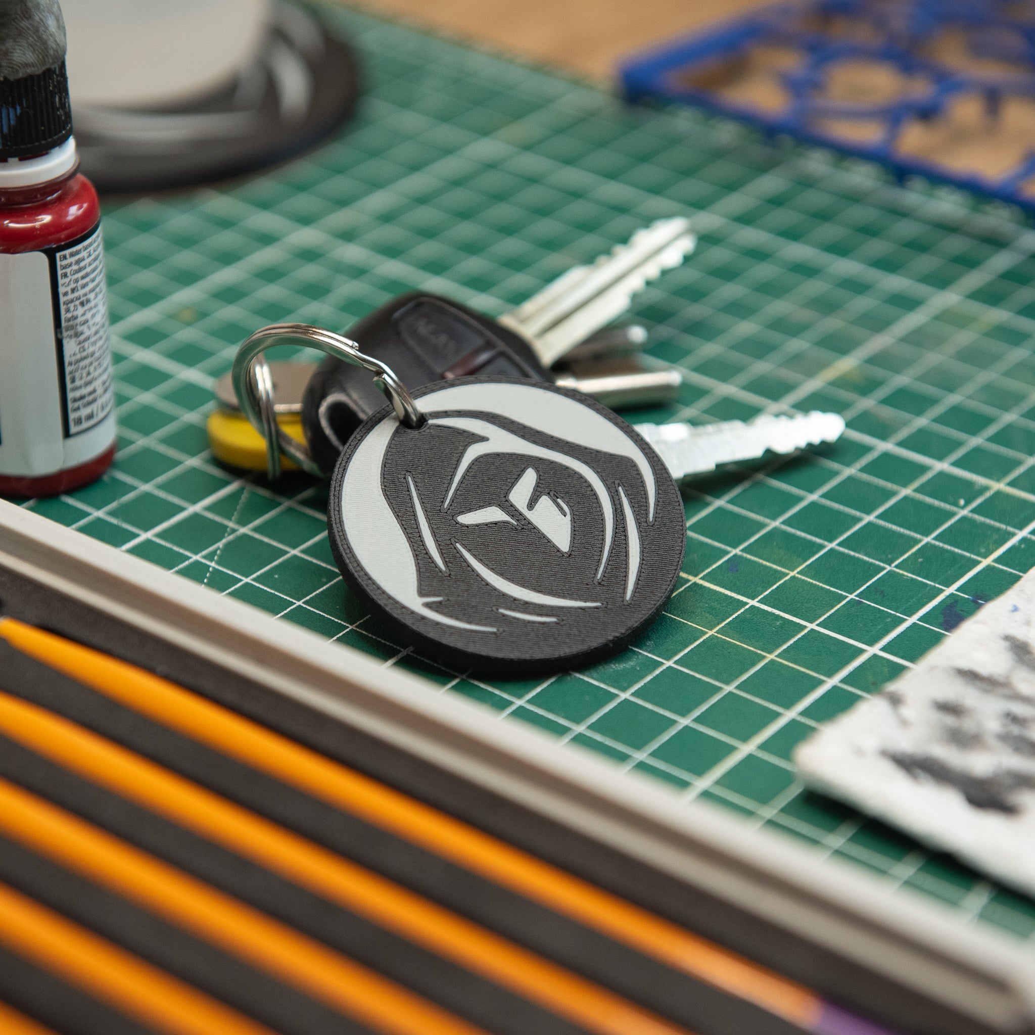 Black Mantle Keyring - The Veil